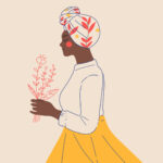 Mixkit woman wearing a bright headscarf and carrying flowers 89 desktop wallpaper